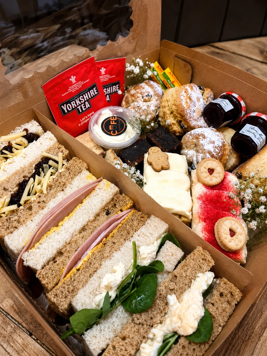 A box of sandwiches, cakes and tea from Cafe on the Cop